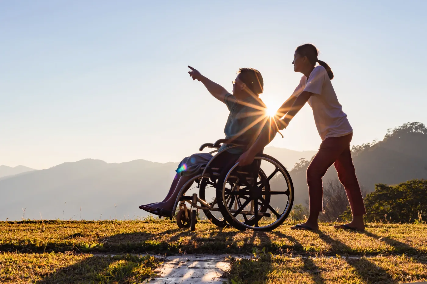 Support worker outdoors with a participant in Melbourne